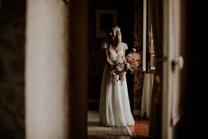 The bride framed in a doorway