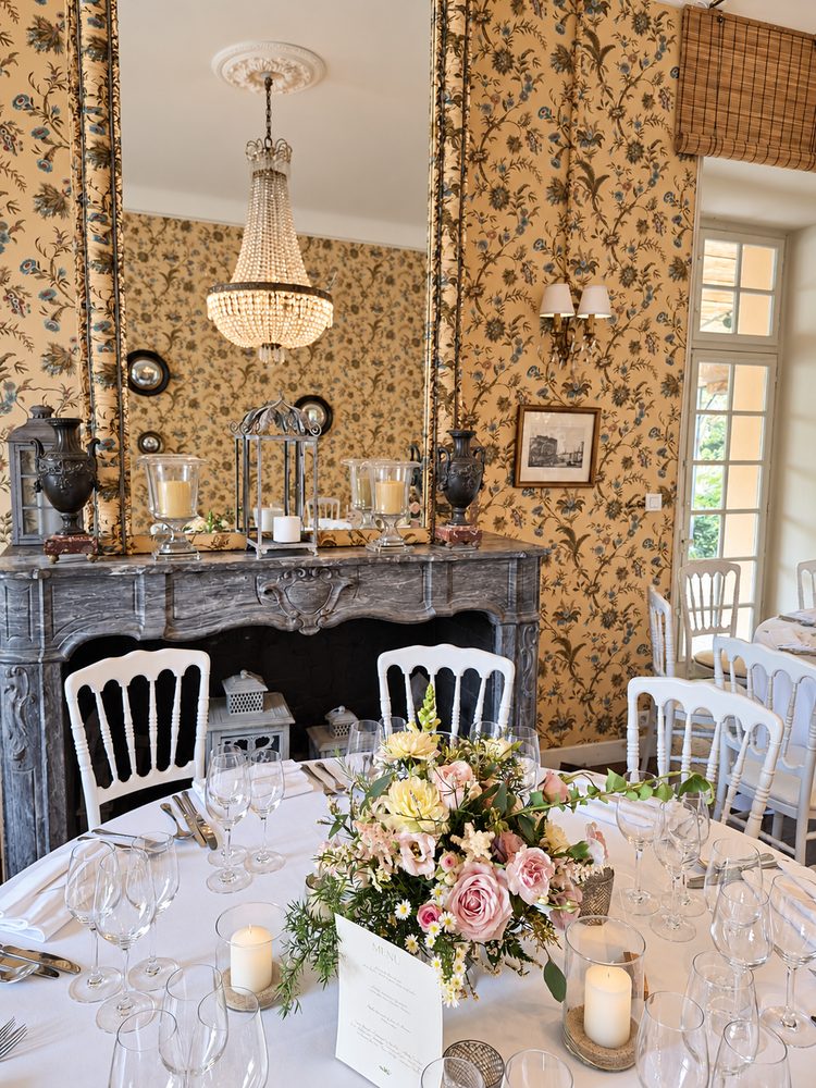 A salon laid before the fireplace