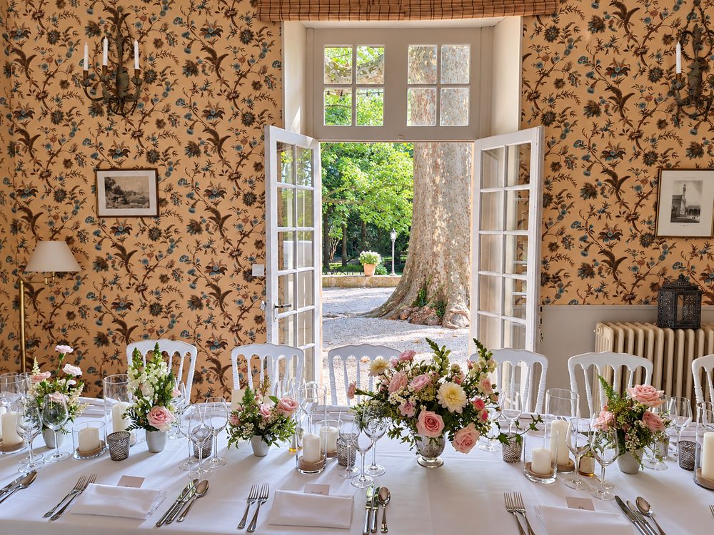 The salon's French windows open onto the park
